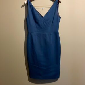 Tahari deep V turquoise sheath mid dress. Fully satin lined. Hidden zipper.